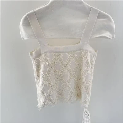 Tops tad-disinjatur tan-nisa high-end