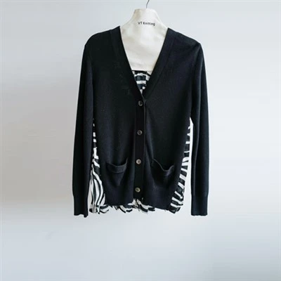 Sweater ħoxna għonq V