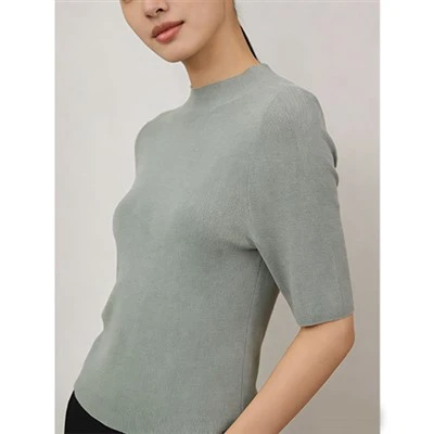 Pullover tas-suf tan-nisa​