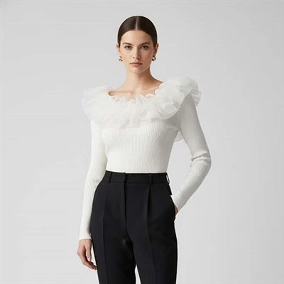 Jumper tan-nisa maħdumin tas-suf