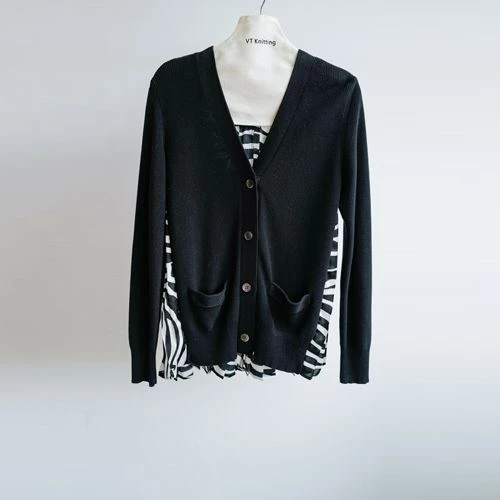 Sweater ħoxna għonq V
